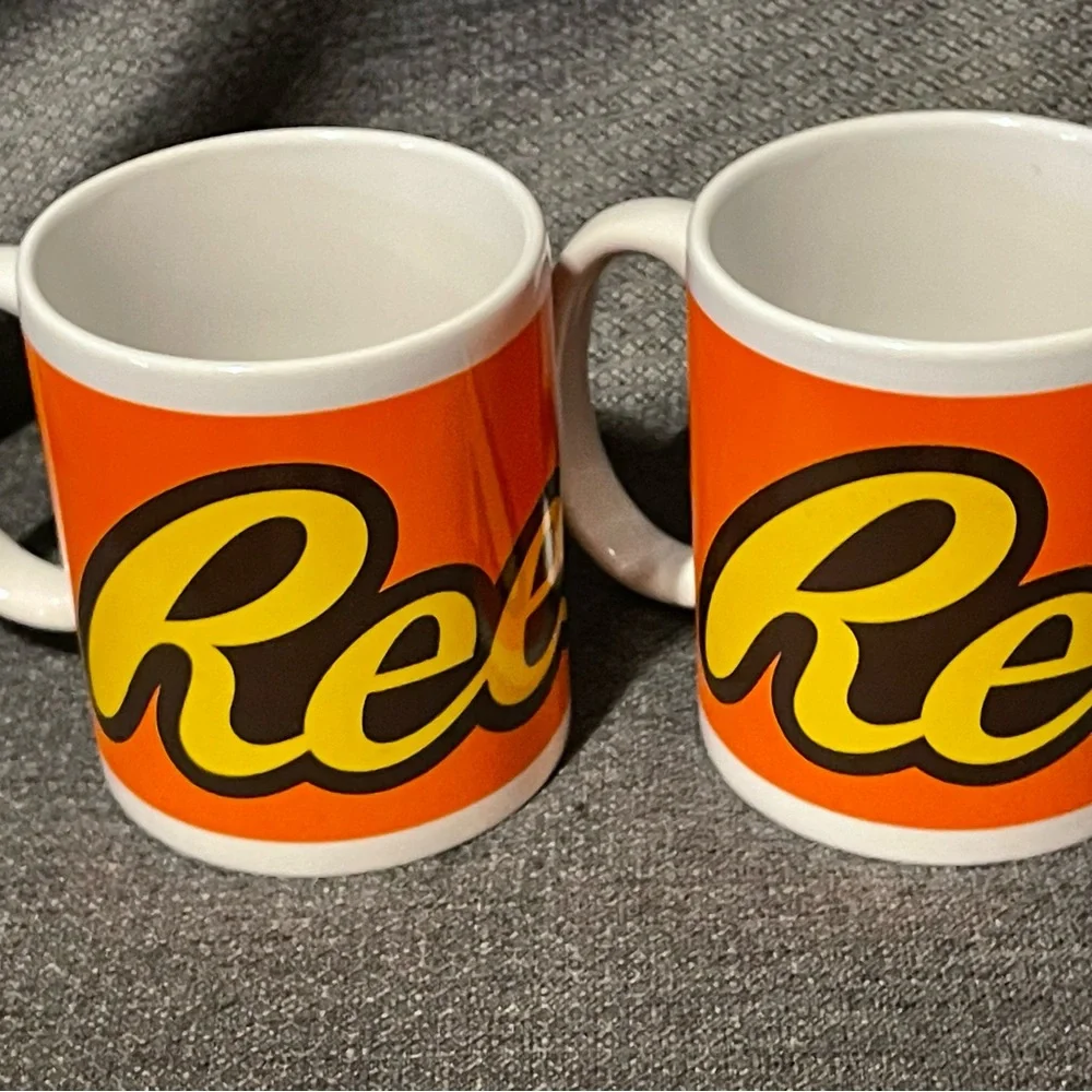 Pair of Reese’s candy mugs.